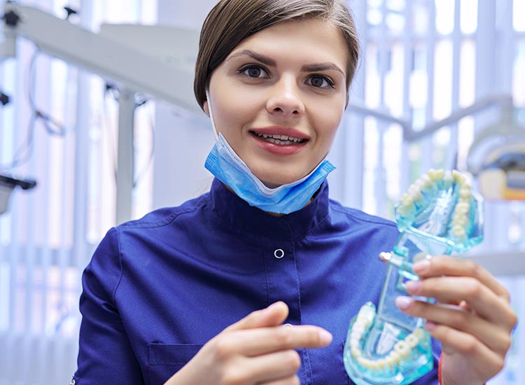 patient with teeth model