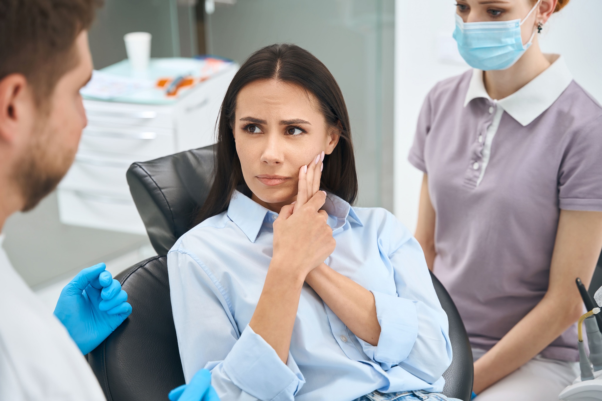 anxious client complaining to dentist