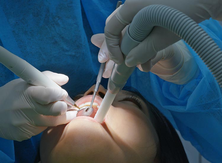 dentist performing sedation dentistry