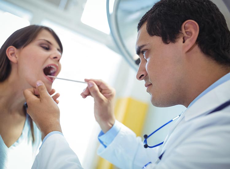 dentist examining patient