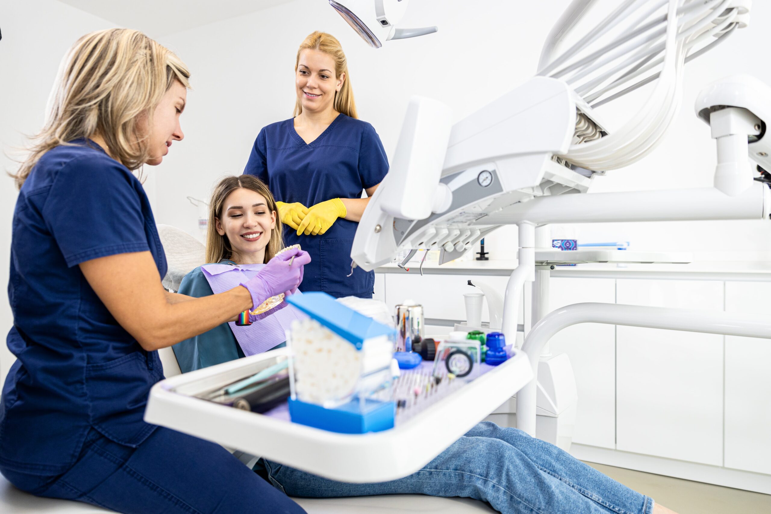 dentist working with assistant