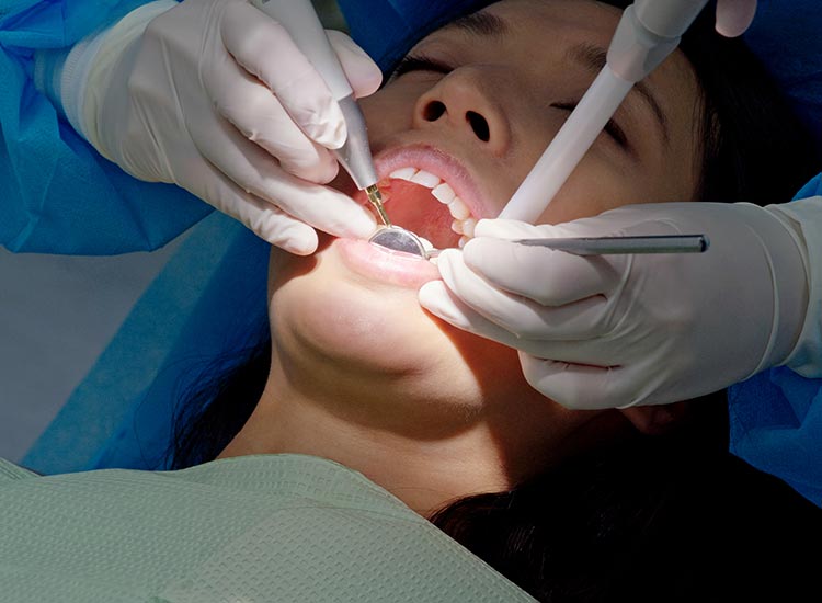 dentist performing restorative dentistry