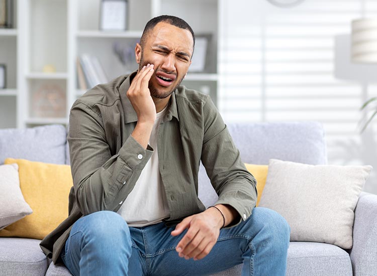 person having tooth pain