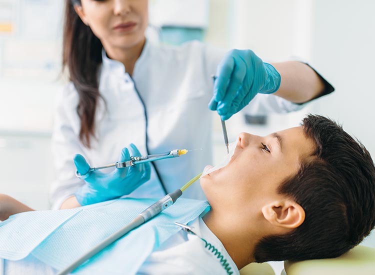 dentist working on child patient