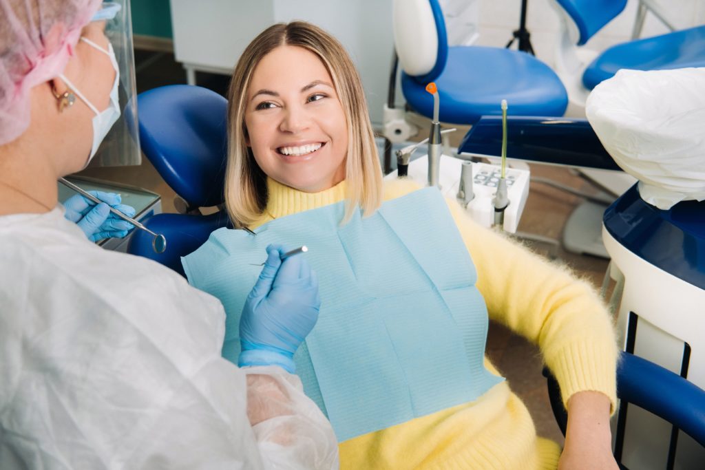 patient smiling at dentist