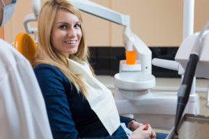 person sitting on dental chair