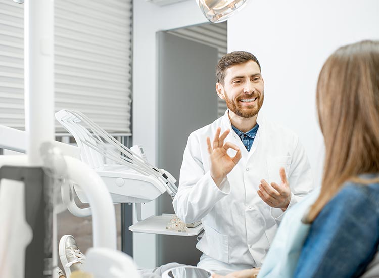 dentist consulting information to patient