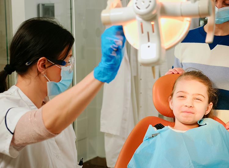 dentist with child patient