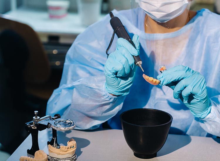 dentist making dentures