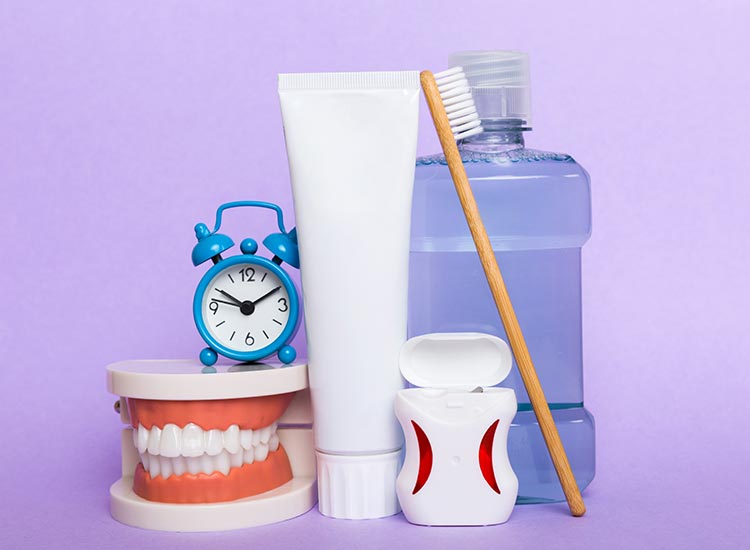 photo of teeth and oral hygiene tools