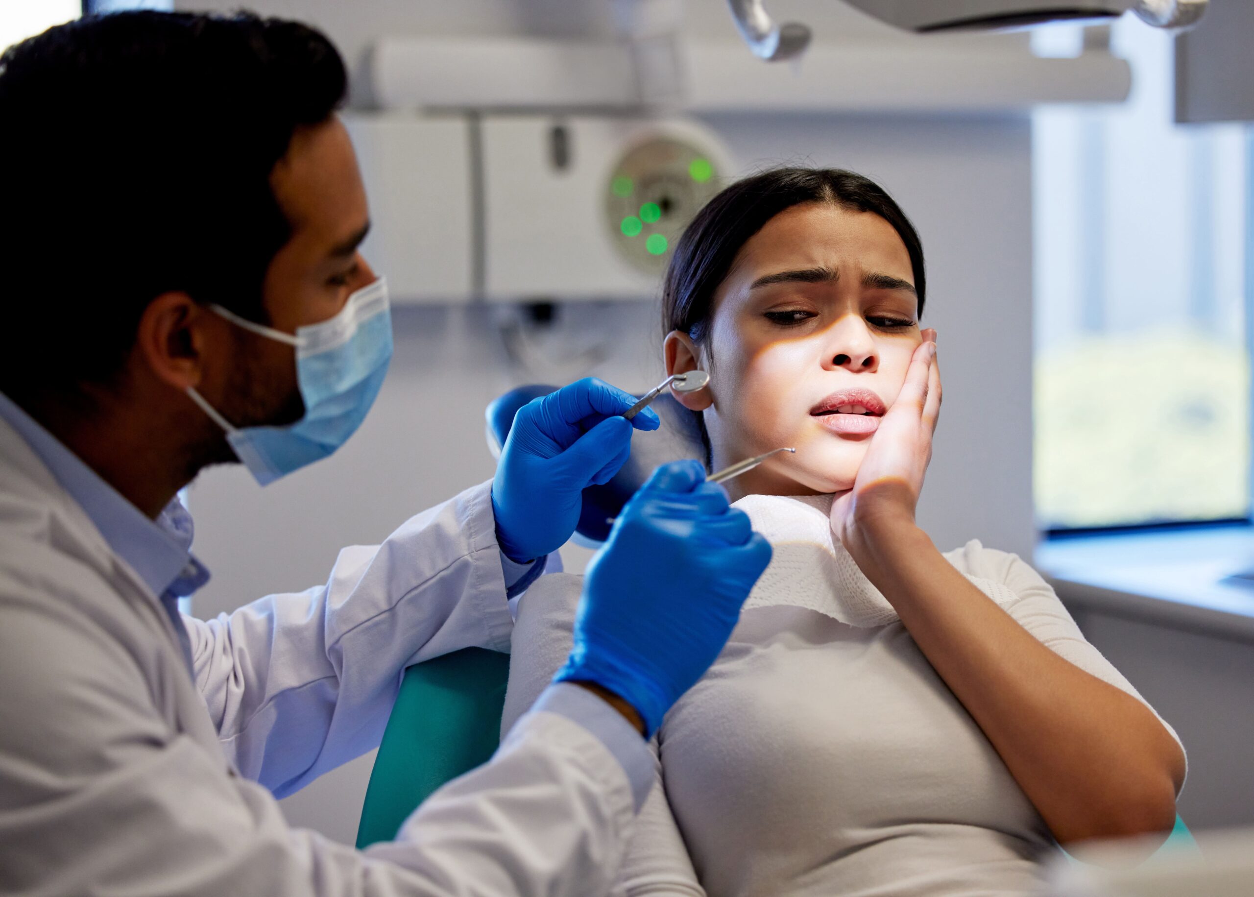 patient scared on dental tools